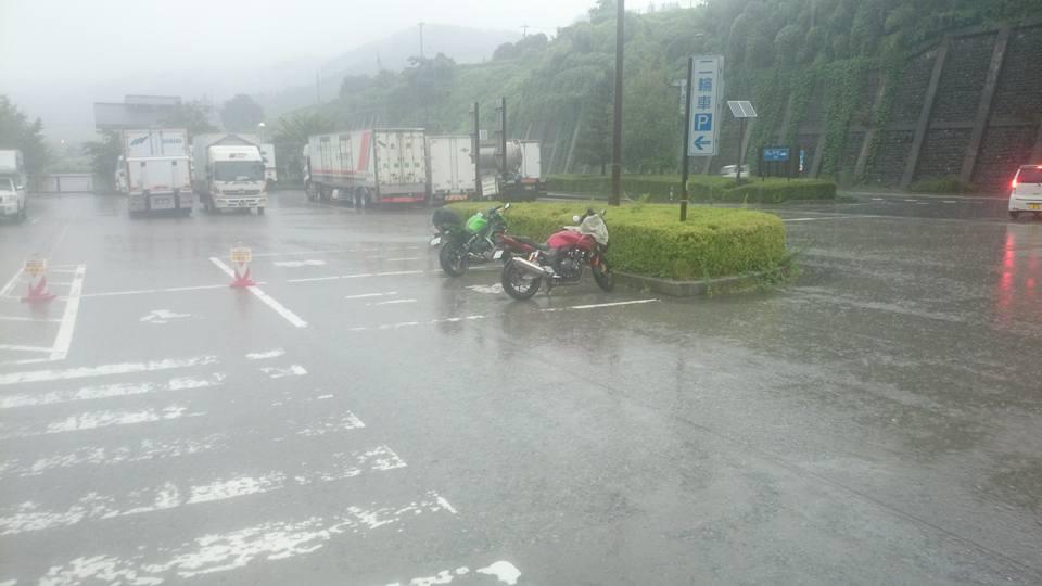 Taking shelter from the rain at a roadside station